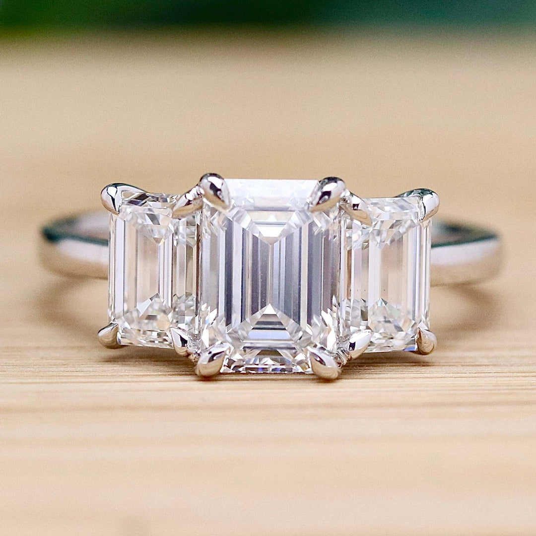 SPECIAL: MANOR ROYAL:  The Charlotte - 3 stone 3.03ctw lab grown emerald cut diamond ring in platinum