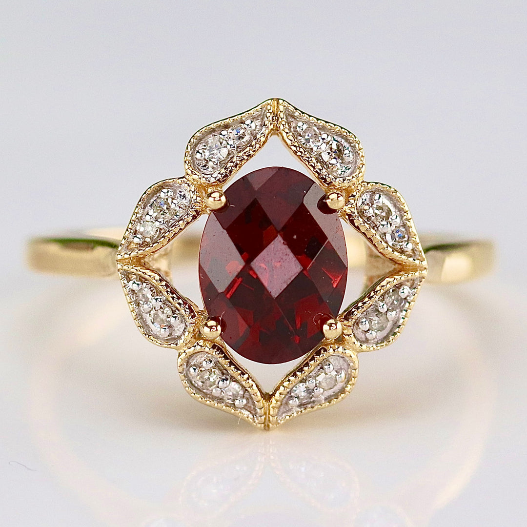 SALE!!  Garnet and diamond ring in 14k yellow gold