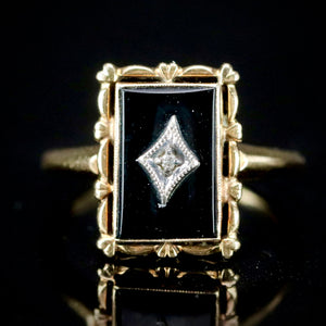 Vintage onyx and diamond ring in yellow gold