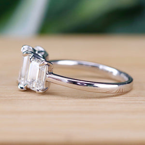 MANOR ROYAL:  The Charlotte - 3 stone 3.03ctw lab grown emerald cut diamond ring in platinum