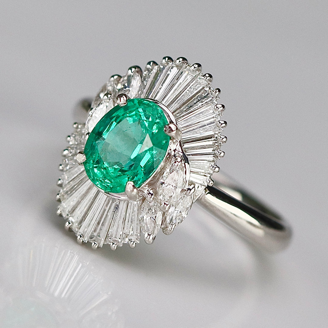 Estate Emerald and diamond ballerina style ring in platinum