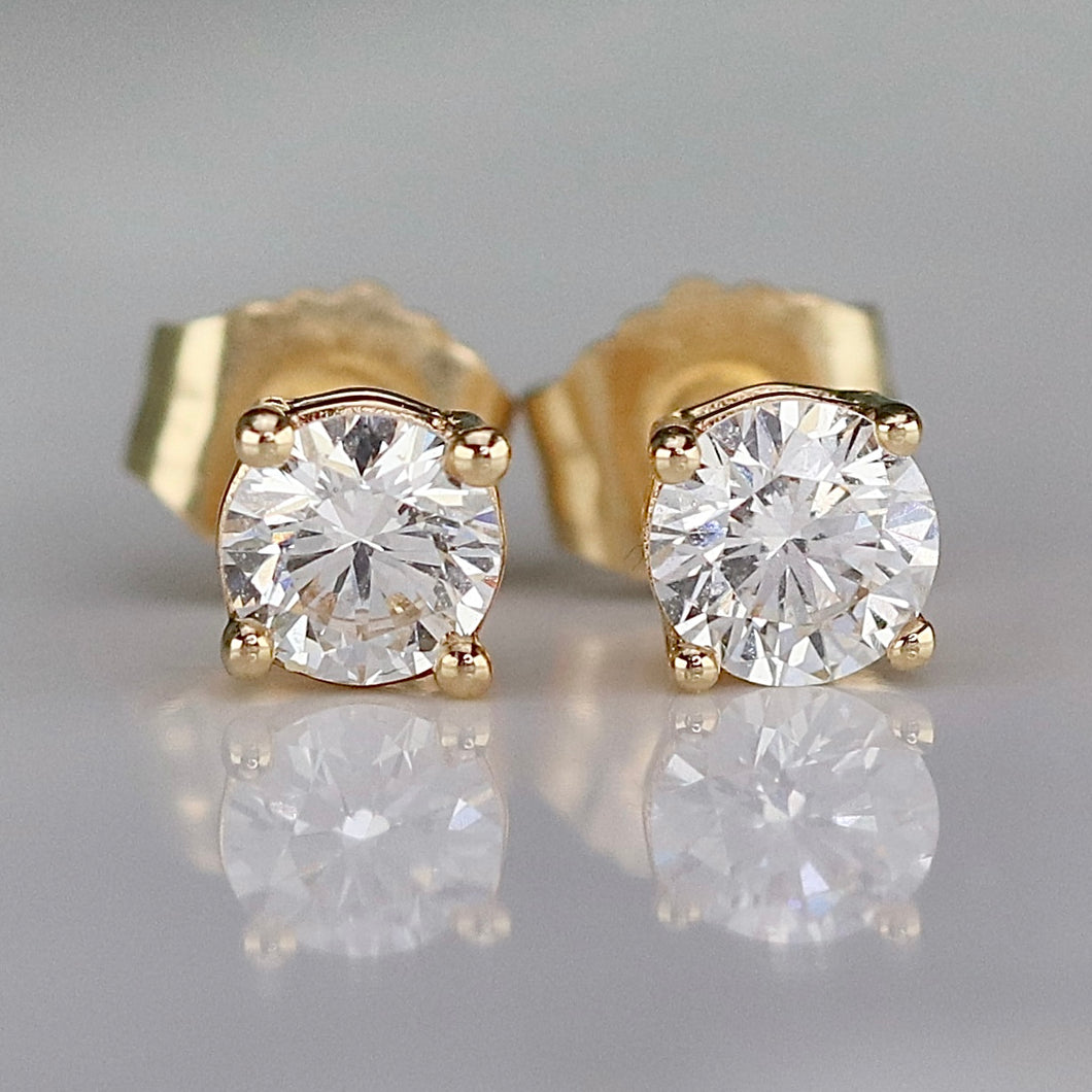 Dainty Lab grown approx .50ctw G-H/SI Diamond studs in 14k yellow gold