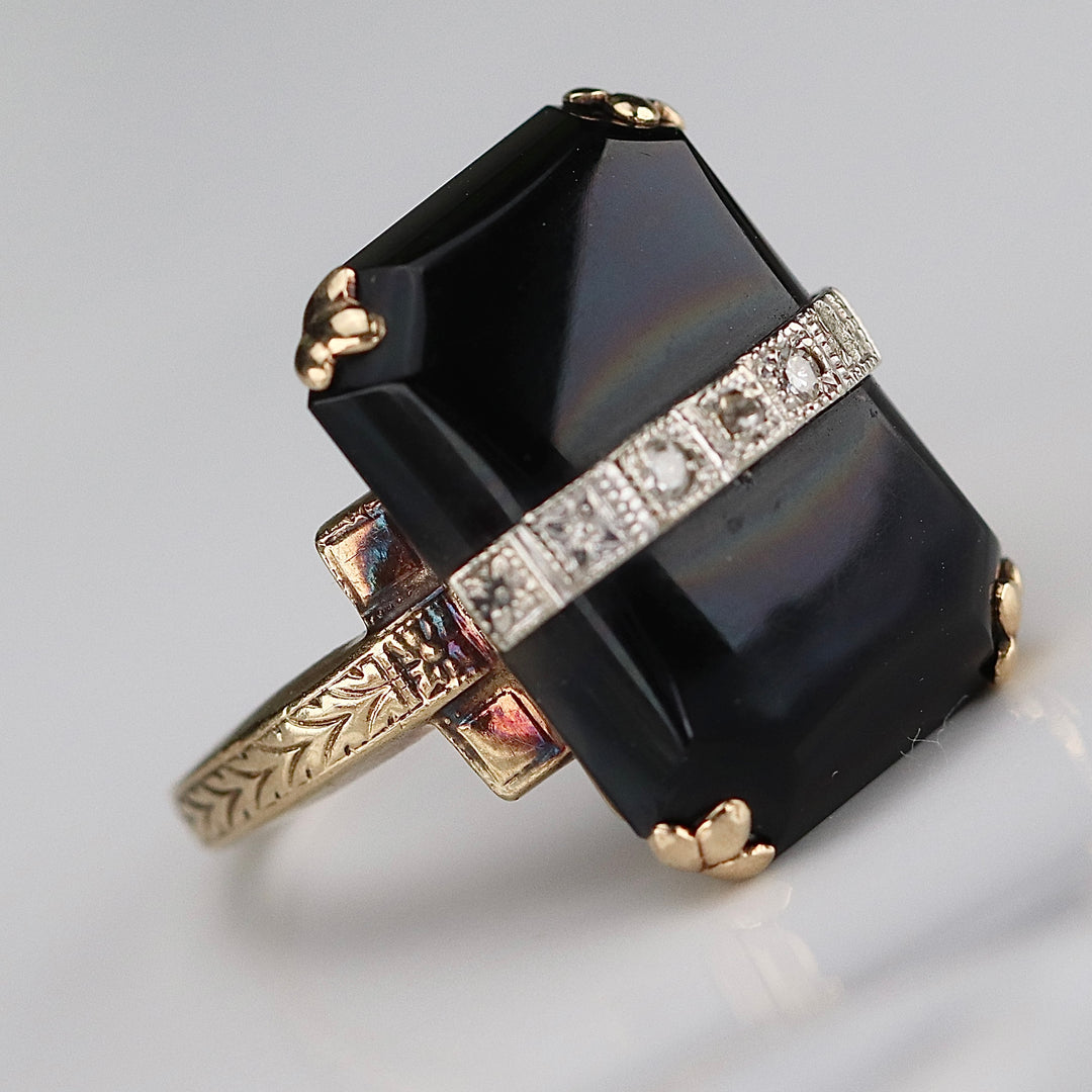 Vintage onyx and diamond ring in yellow gold