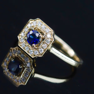 Sapphire and diamond halo ring in 14k yellow gold