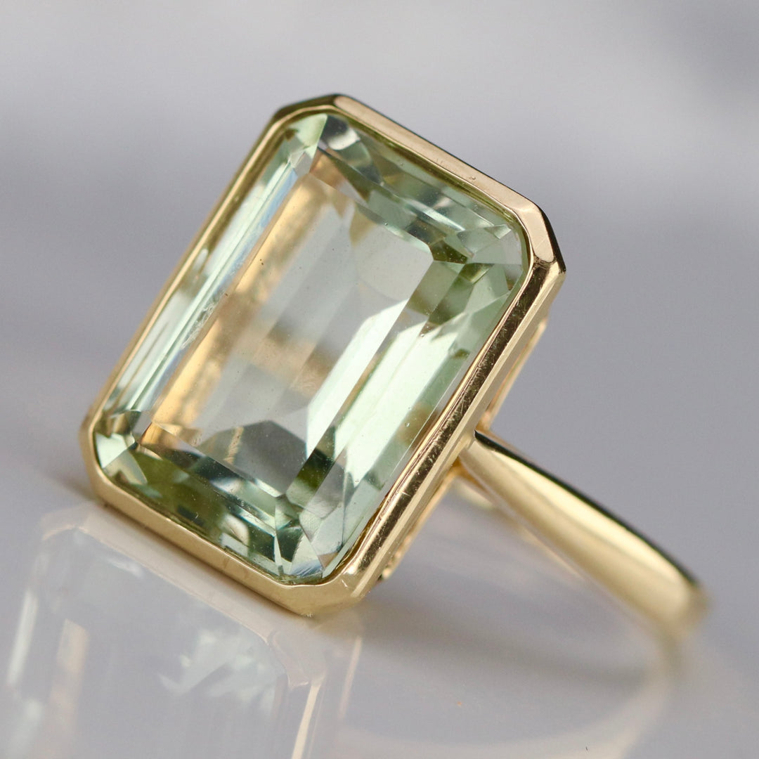 Emerald cut 8.28ct prasiolite ring in 14k yellow gold