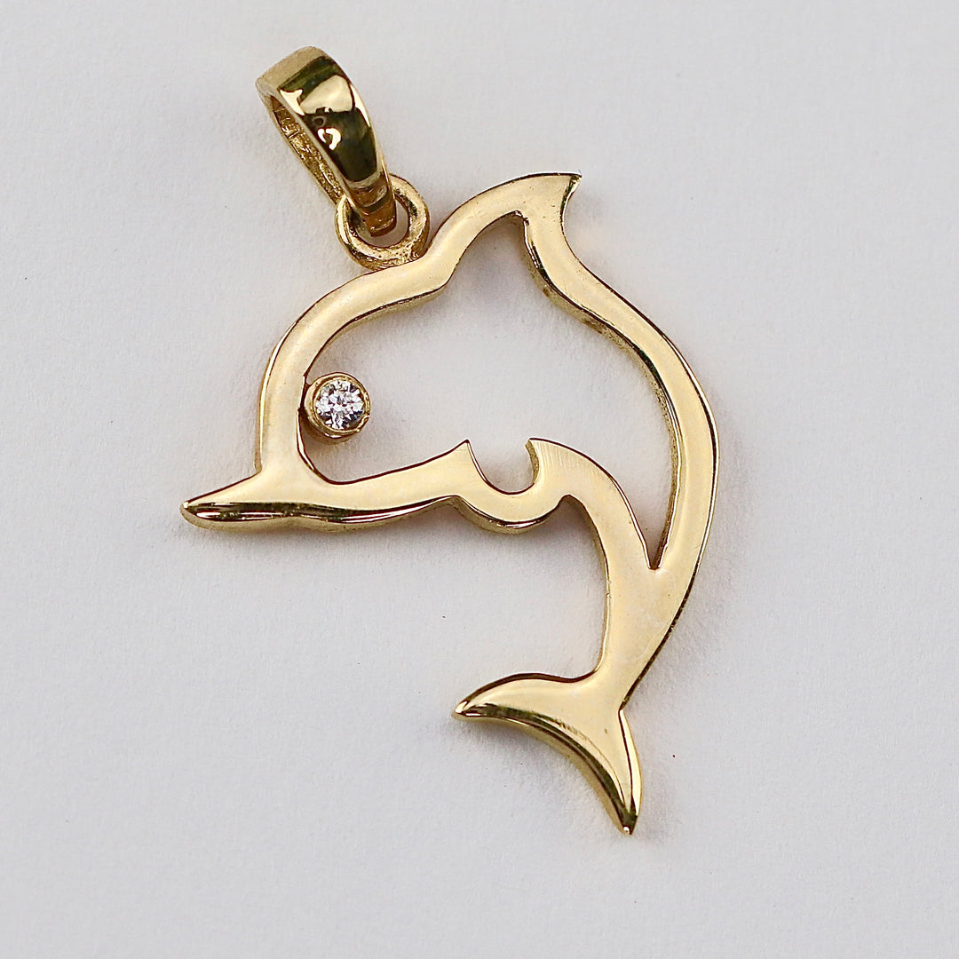 Diamond dolphin charm/pendant in 14k yellow gold