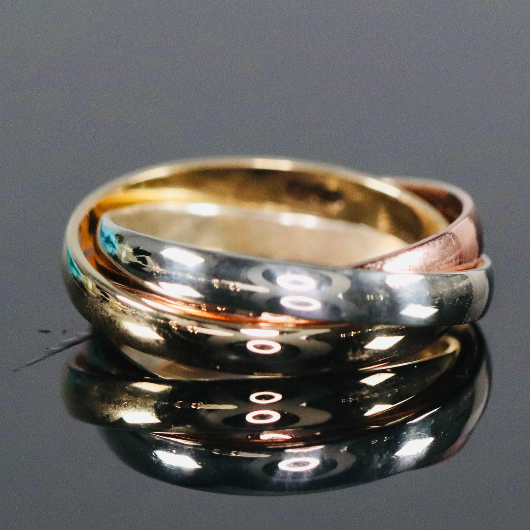 Vintage rolling ring in tri color gold from Manor Jewels