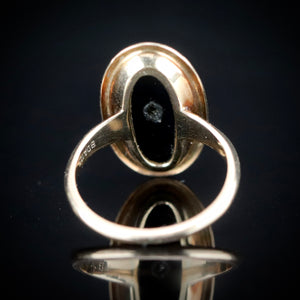 Vintage oval Onyx and diamond ring in yellow gold