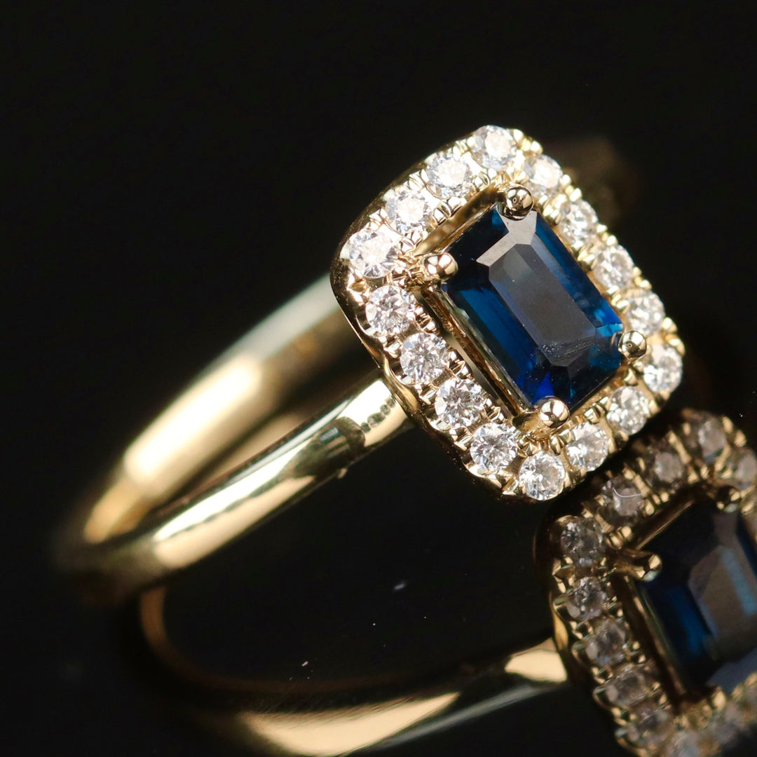 Sapphire and diamond halo ring in 14k yellow gold