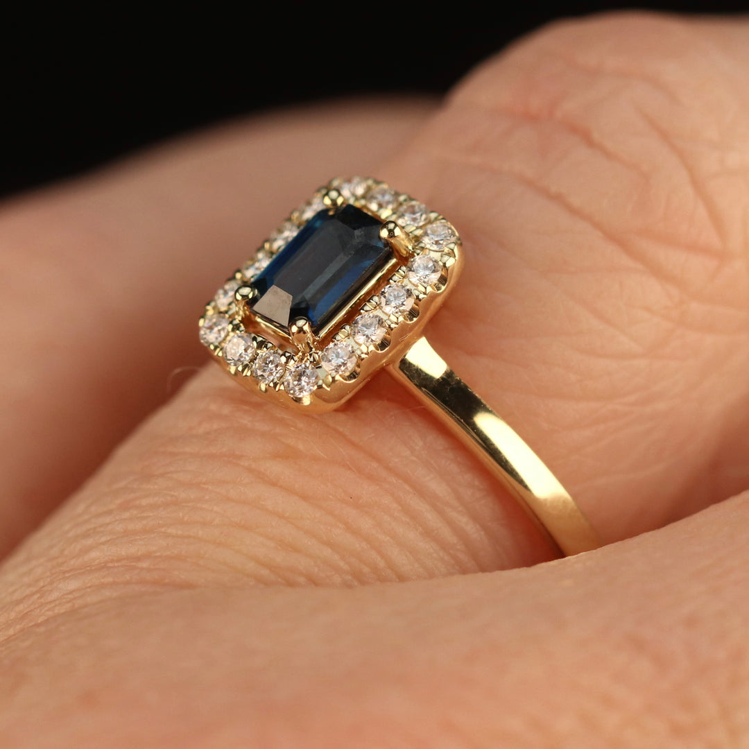 Sapphire and diamond halo ring in 14k yellow gold