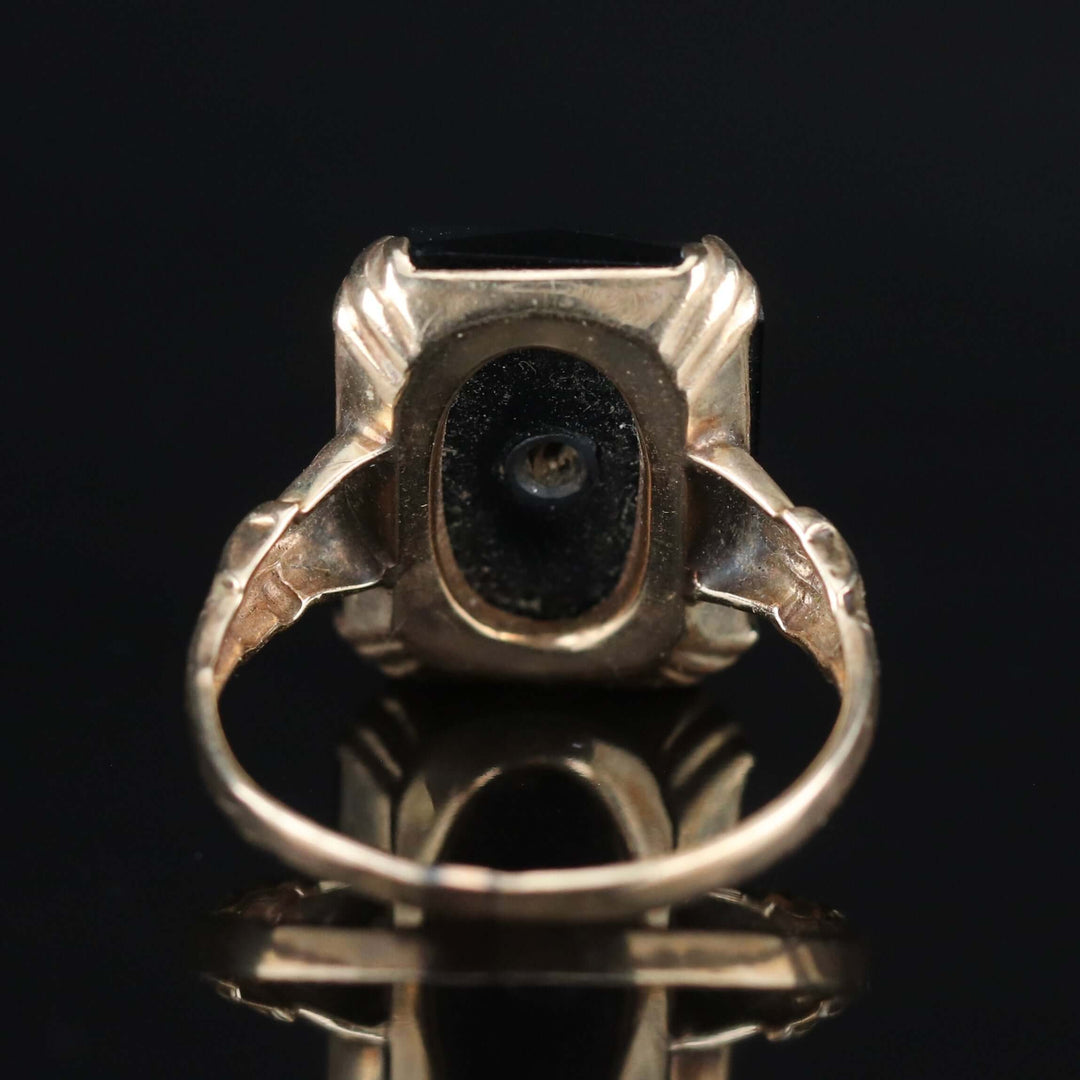 Vintage faceted Onyx and diamond ring in yellow gold