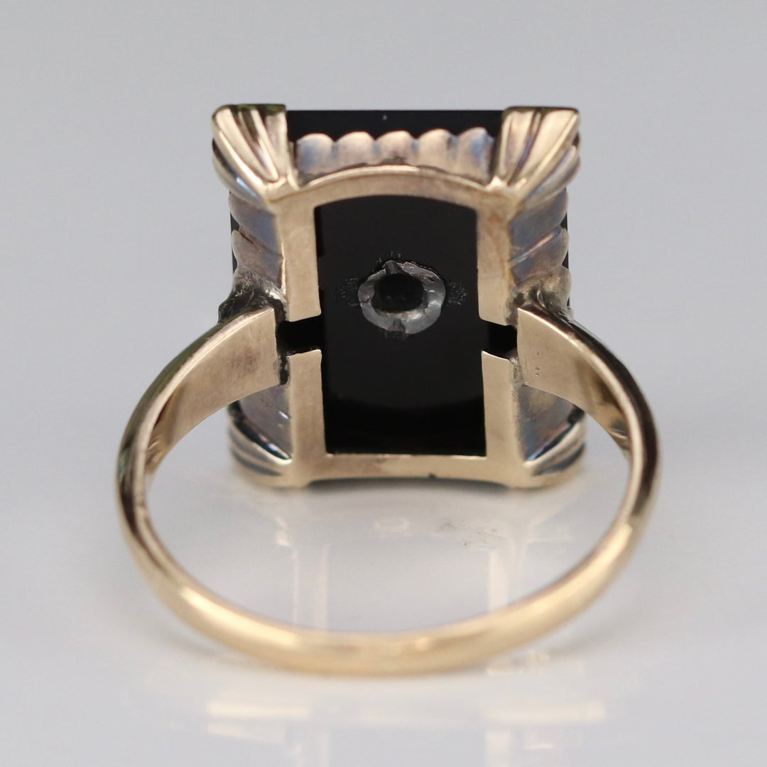 Vintage onyx and diamond ring in yellow gold