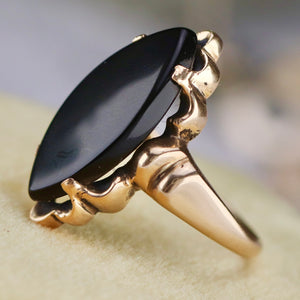 Vintage onyx navette ring in yellow gold