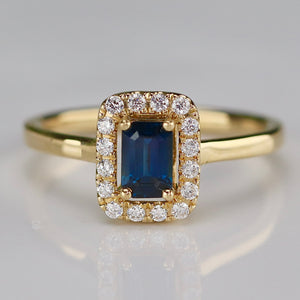 Sapphire and diamond halo ring in 14k yellow gold