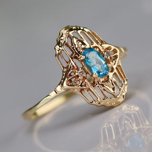 Vintage blue topaz and diamond plaque ring in yellow gold