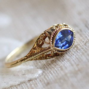 Vintage marquise cut lab grown blue sapphire ring in yellow gold