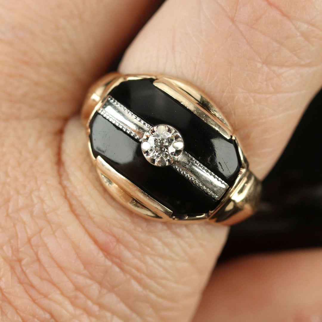 Vintage onyx and diamond ring in yellow gold