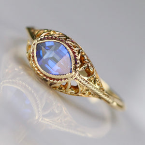 Vintage marquise cut lab grown blue sapphire ring in yellow gold