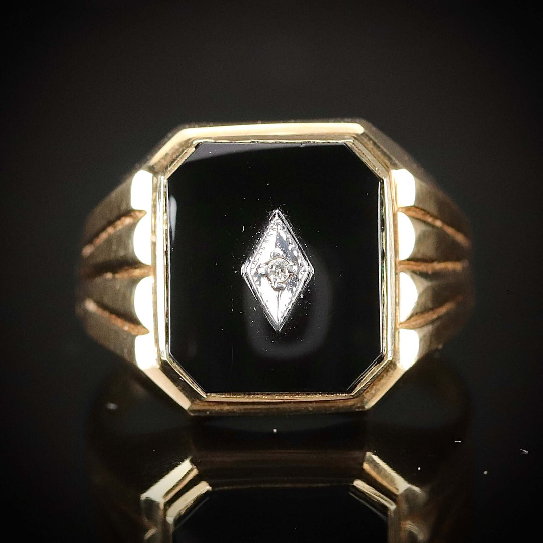 Vintage large onyx and diamond ring in yellow gold