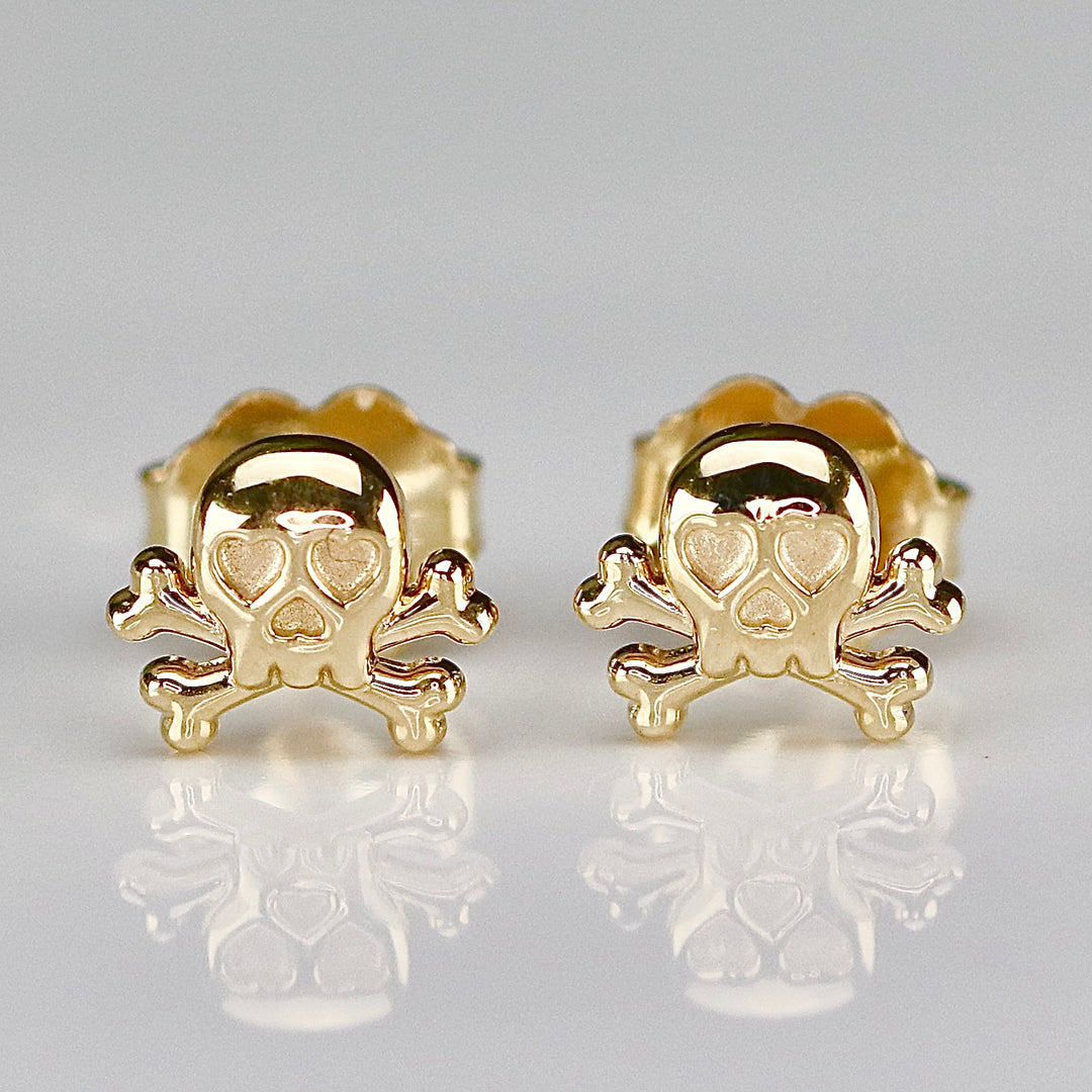 14k yellow gold skull and crossbones studs