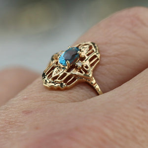 Vintage blue topaz and diamond plaque ring in yellow gold