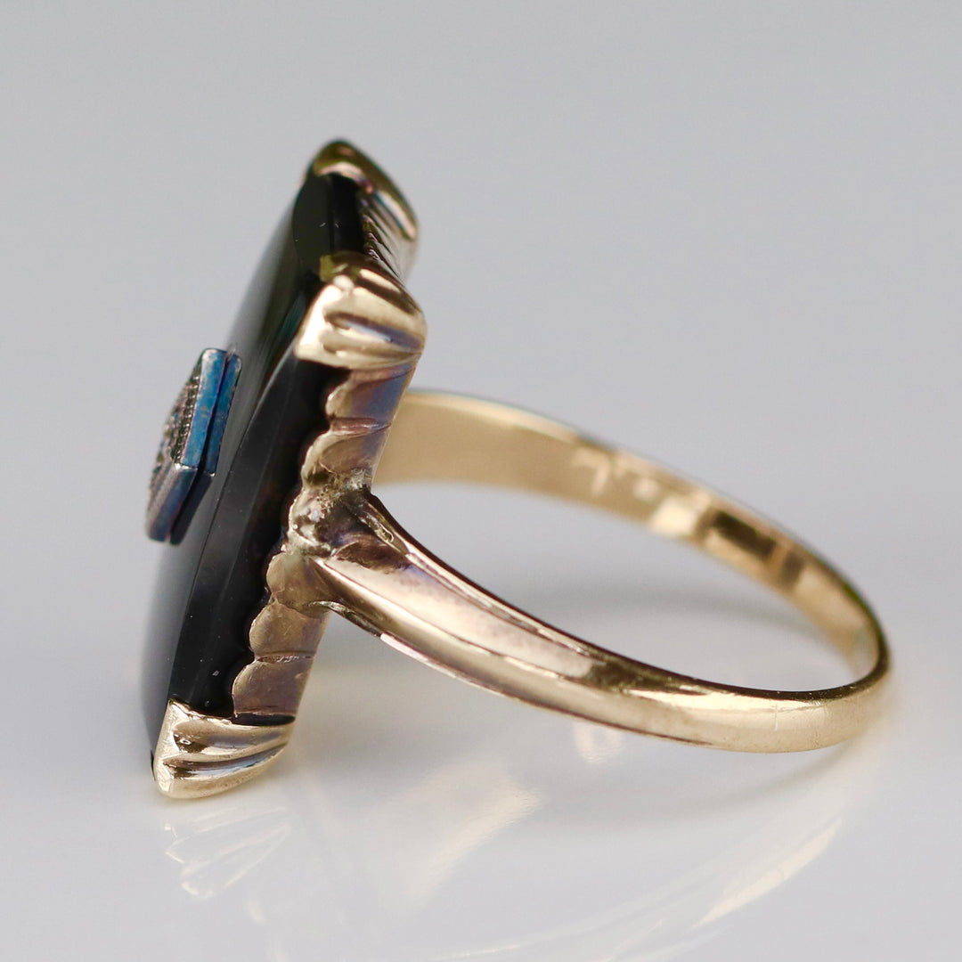 Vintage onyx and diamond ring in yellow gold