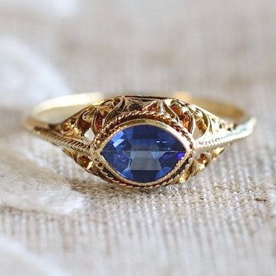 Vintage marquise cut lab grown blue sapphire ring in yellow gold