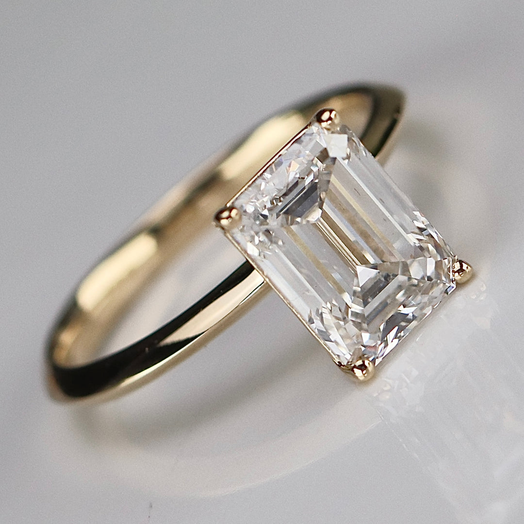 SPECIAL: 3ct emerald cut lab grown solitaire diamond ring in 14k yellow gold