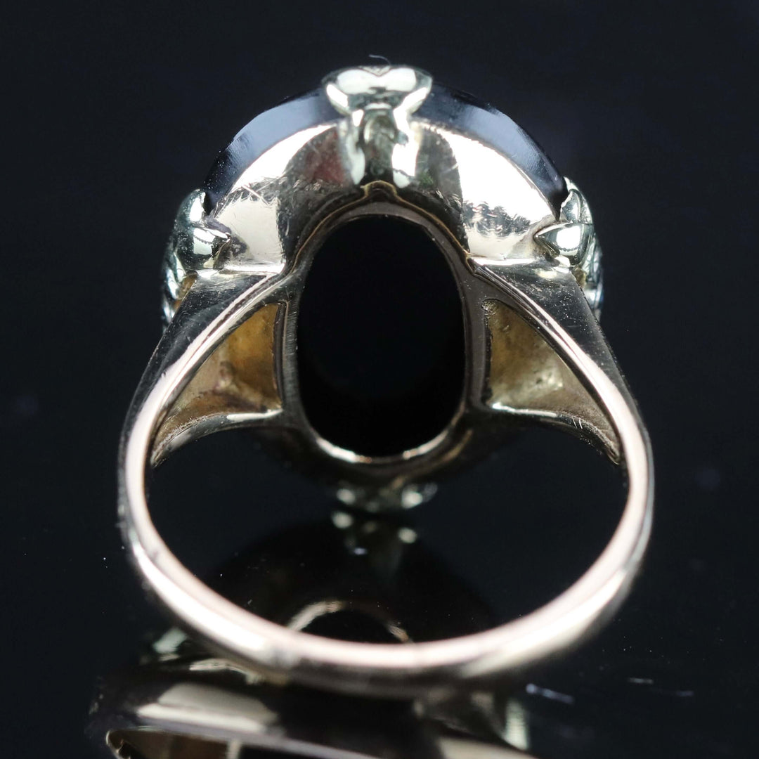 Vintage onyx and diamond ring in yellow gold