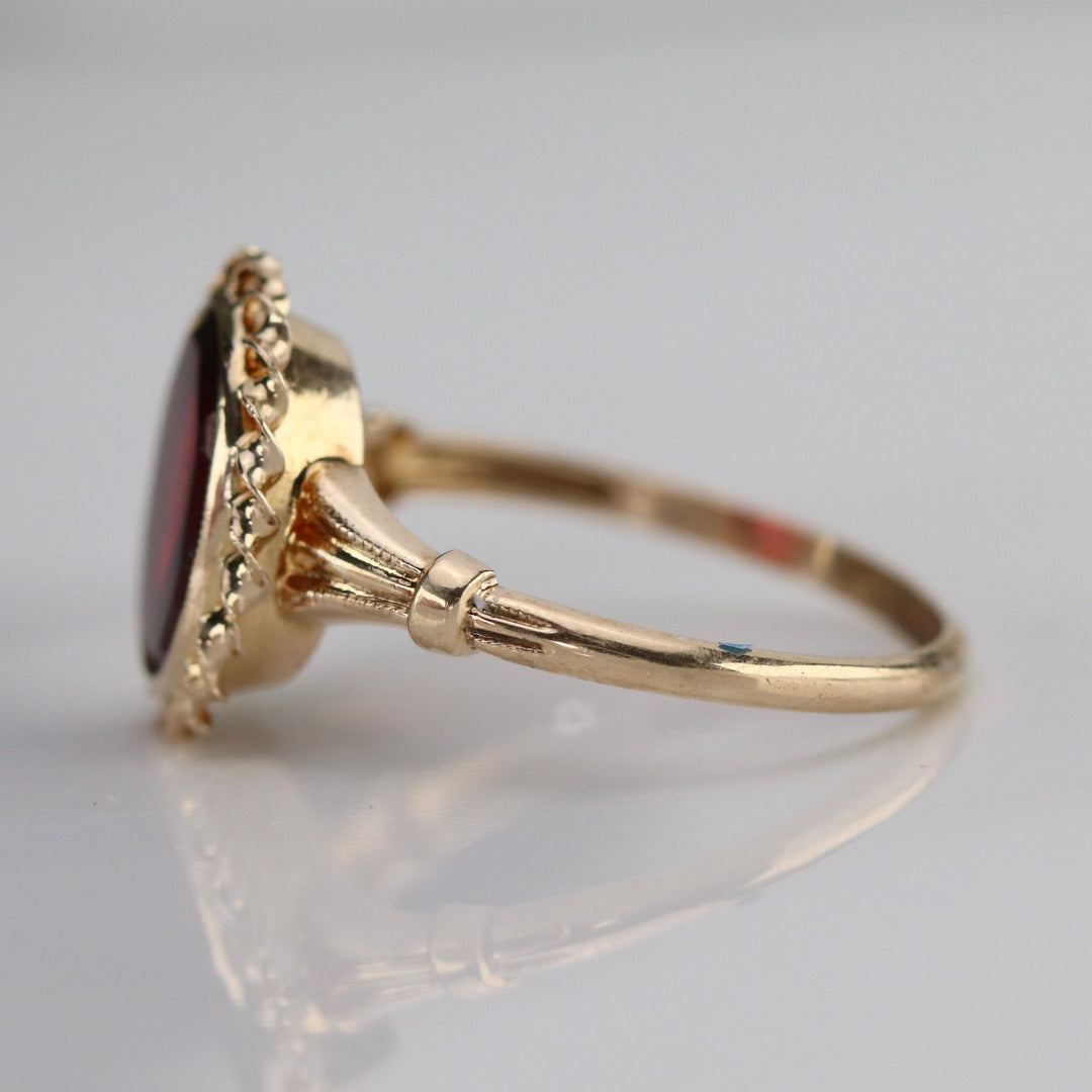 Vintage red paste ring in yellow gold