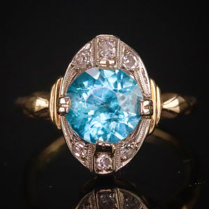 Vintage ring with blue zircon and diamonds in yellow and white gold