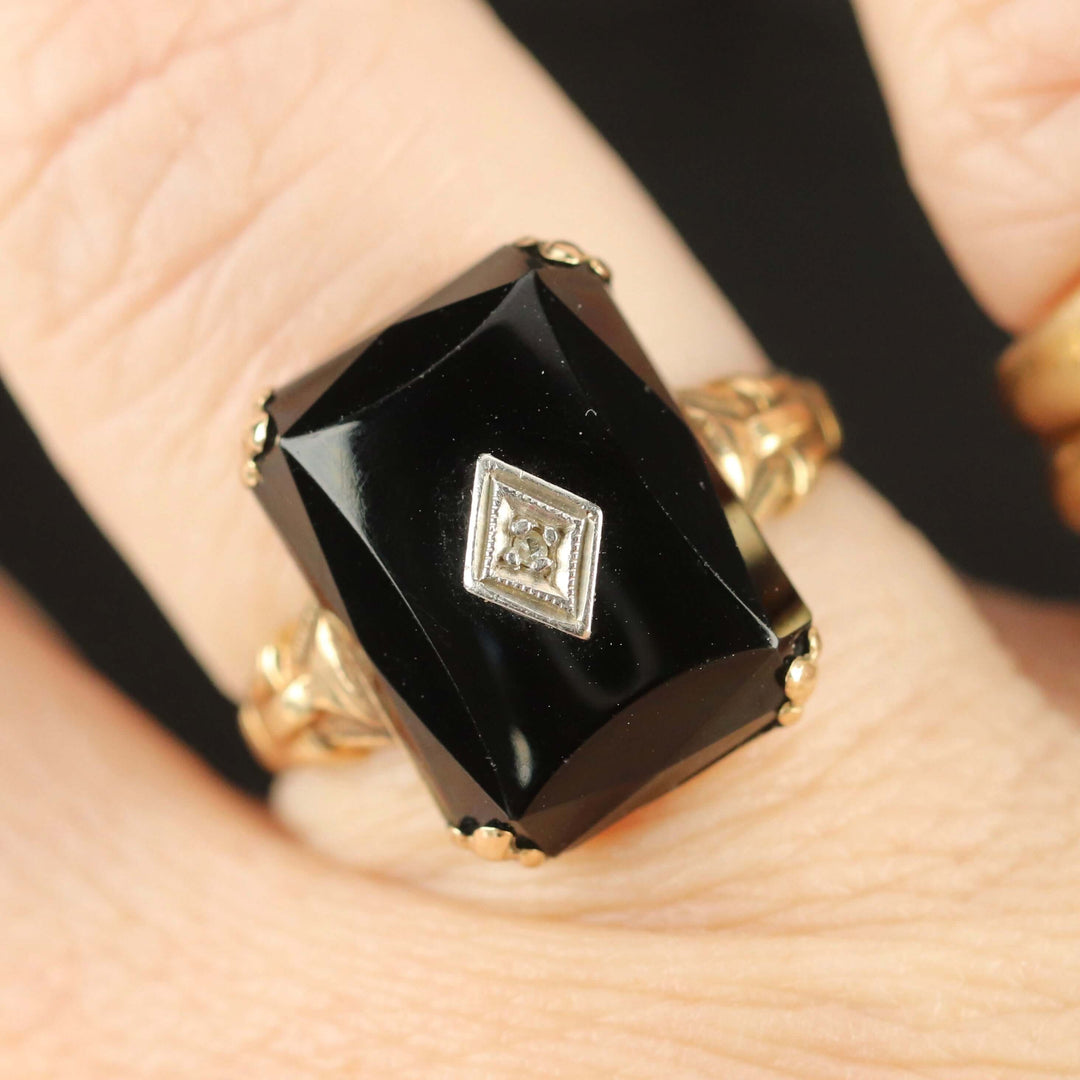 Vintage faceted Onyx and diamond ring in yellow gold