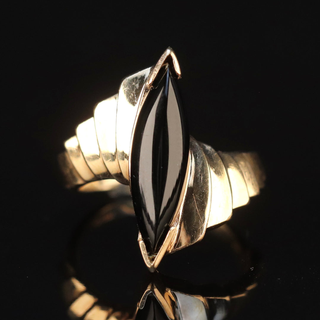 Vintage onyx navette ring in yellow gold