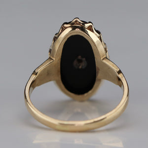 Classic vintage onyx and diamond ring in yellow gold