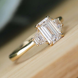 MANOR ROYAL:  The Queen Anne - 3 stone 1.40ctw lab grown emerald cut diamond ring in 14k yellow gold