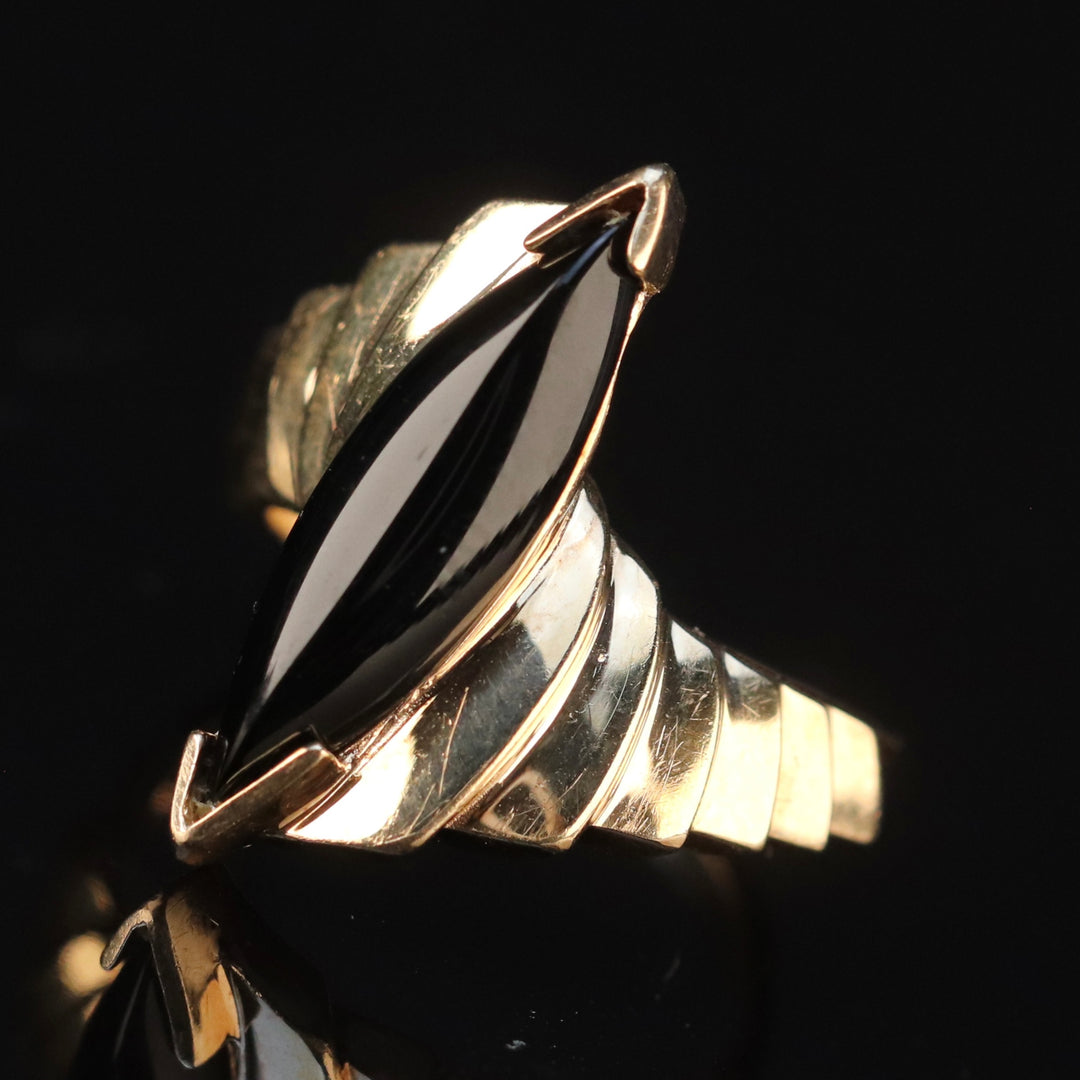 Vintage onyx navette ring in yellow gold