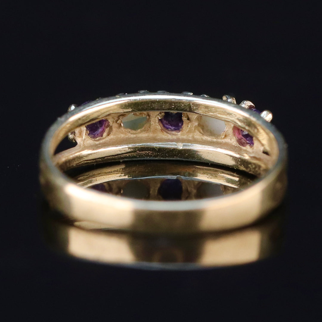 Vintage amethyst and pearl ring in yellow gold