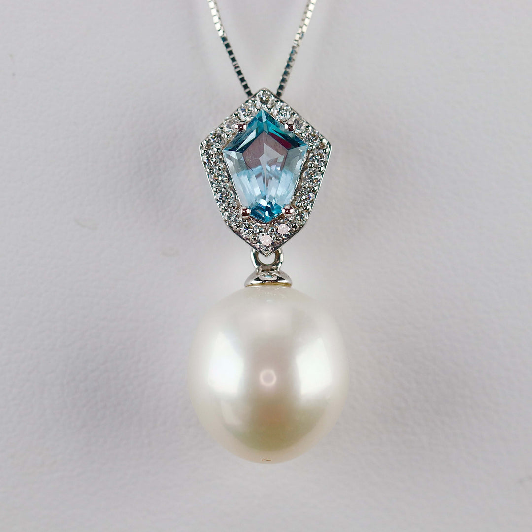 50% OFF CLEARANCE!  14k white gold exceptional blue topaz, diamond and pearl necklace