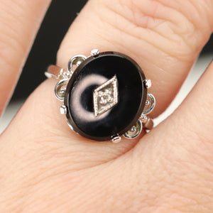 Vintage Onyx and diamond ring in white gold