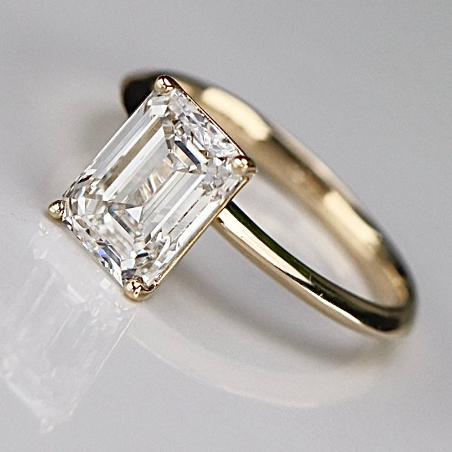 SPECIAL: 3ct emerald cut lab grown solitaire diamond ring in 14k yellow gold