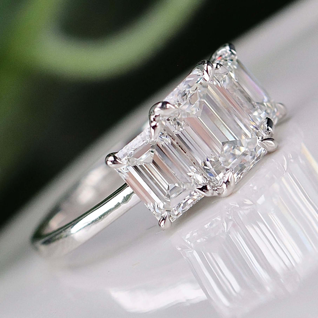 SPECIAL: MANOR ROYAL:  The Charlotte - 3 stone 3.03ctw lab grown emerald cut diamond ring in platinum