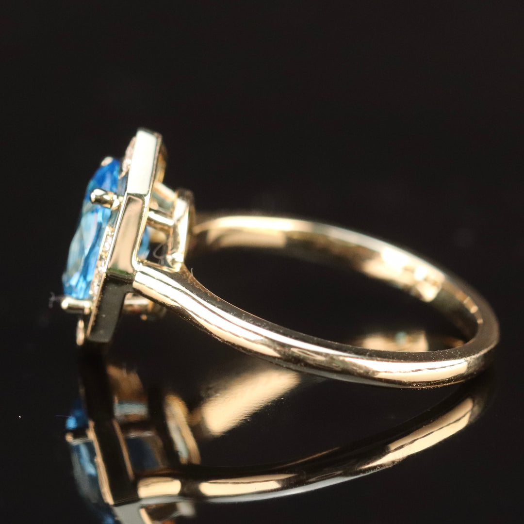 RESERVED FOR DI:  PAYMENT 1 OF 5: SALE!!  Blue topaz and diamond ring in 14k yellow gold