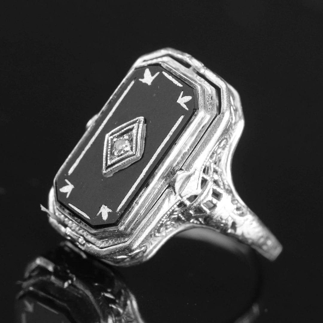 Vintage flip ring with onyx and cameo in 14k white gold