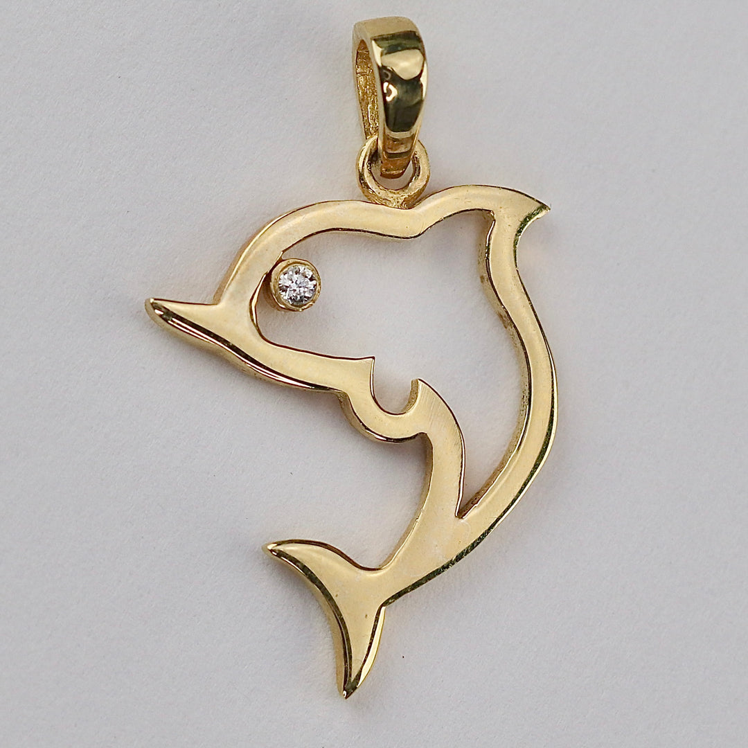 Diamond dolphin charm/pendant in 14k yellow gold