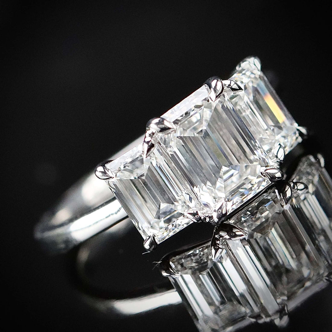 SPECIAL: MANOR ROYAL:  The Charlotte - 3 stone 3.03ctw lab grown emerald cut diamond ring in platinum