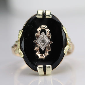 Oval vintage black onyx and diamond ring in yellow gold ring By Manor Jewels