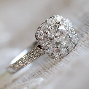 Lab grown diamond halo ring in 14k white gold