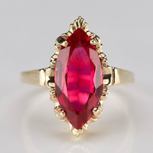 Lab grown Ruby navette ring in 10k yellow gold