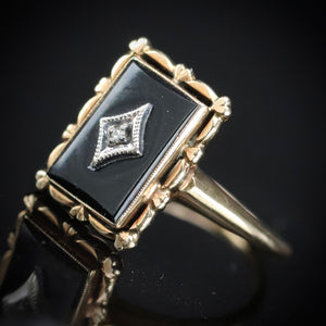 Vintage onyx and diamond ring in yellow gold