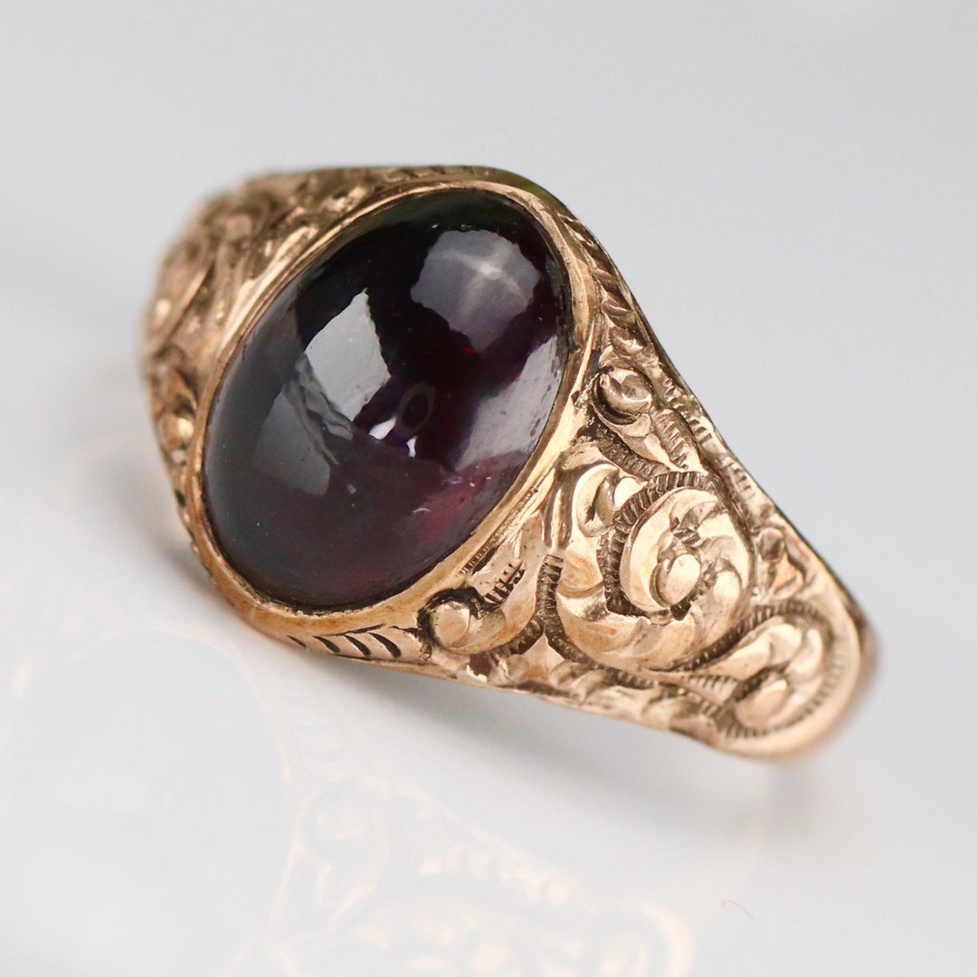 Antique garnet cabochon ring in rose gold